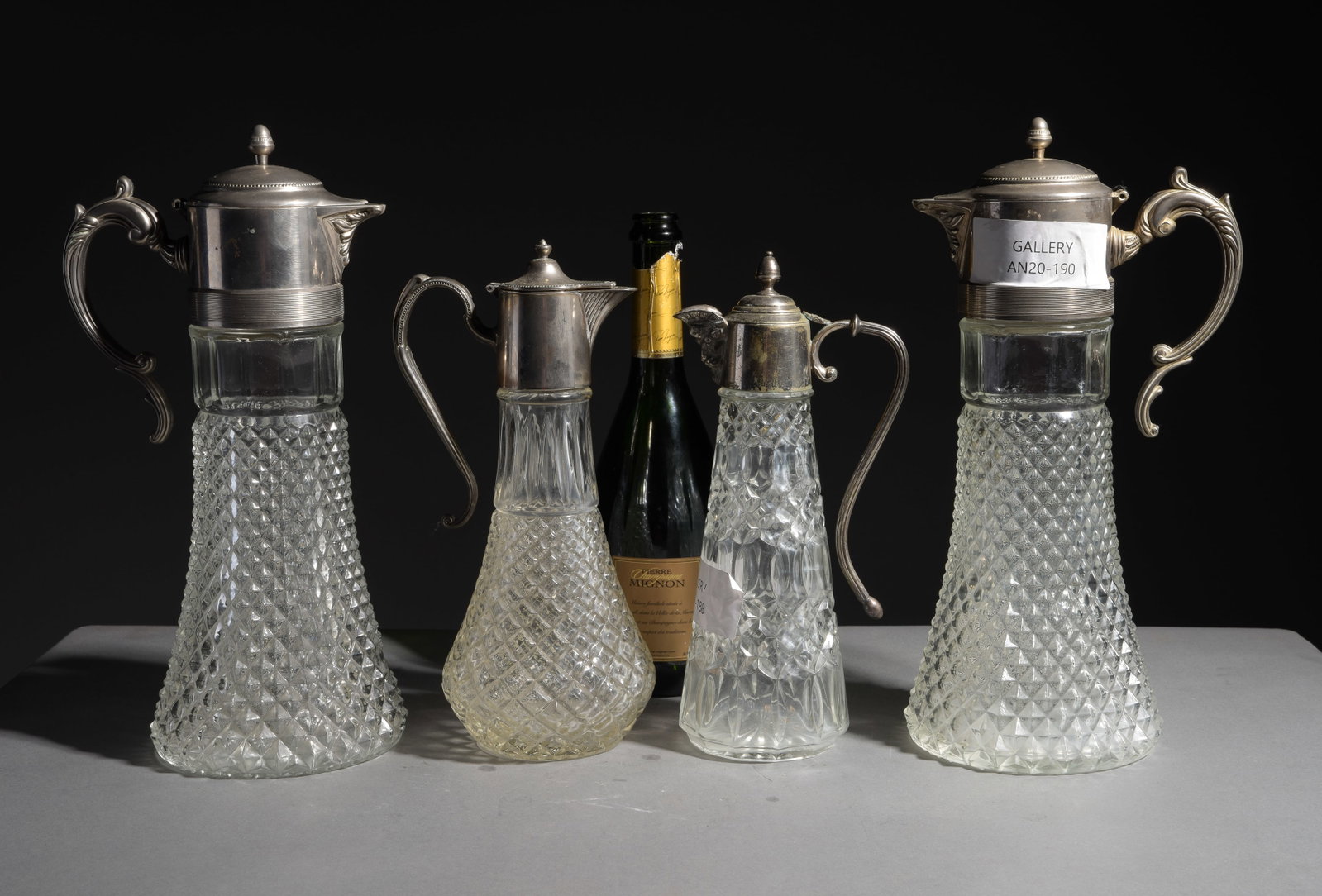 Four Assorted Cut Glass Silver Capped Claret Jugs #2 (1 of 8)