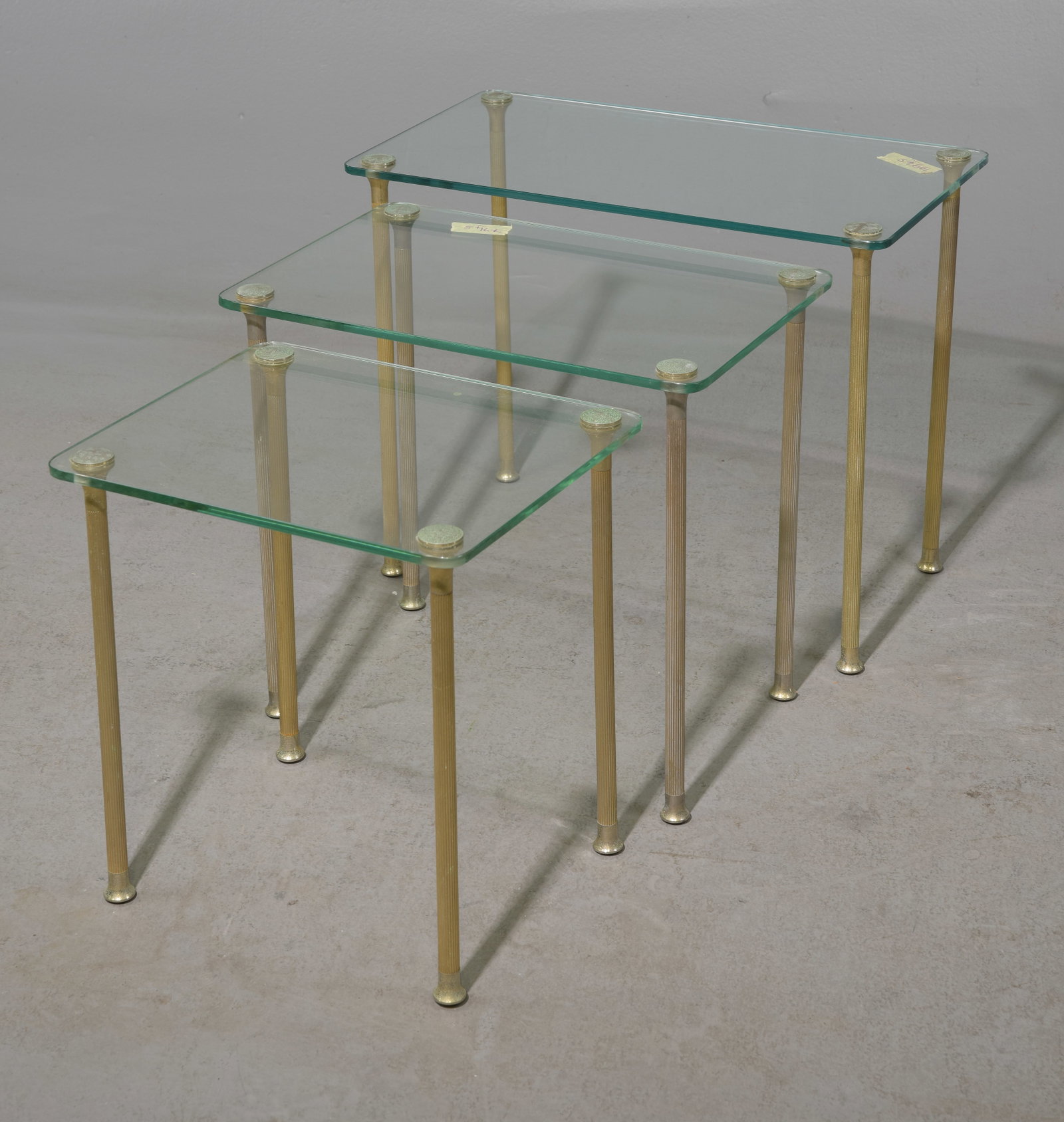 French Glass & Brass Finished Nest of 3 Tables: French Glass & Brass Finished Nest of 3 Tables - 17 intall x 21.25 x 12, 18 in tall x 17.75 x 11.75 and 15 in tall x 14 x 12