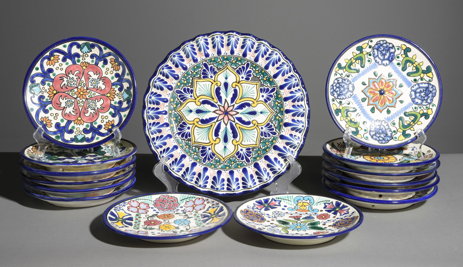 15pcs Hand Painted Italian Plates: 15pcs Hand Painted Italian Plates - Largest is 1 in tall x 12.25 inch diameter and The smaller ones are 1.25 in tall x 8.25 inch diameter