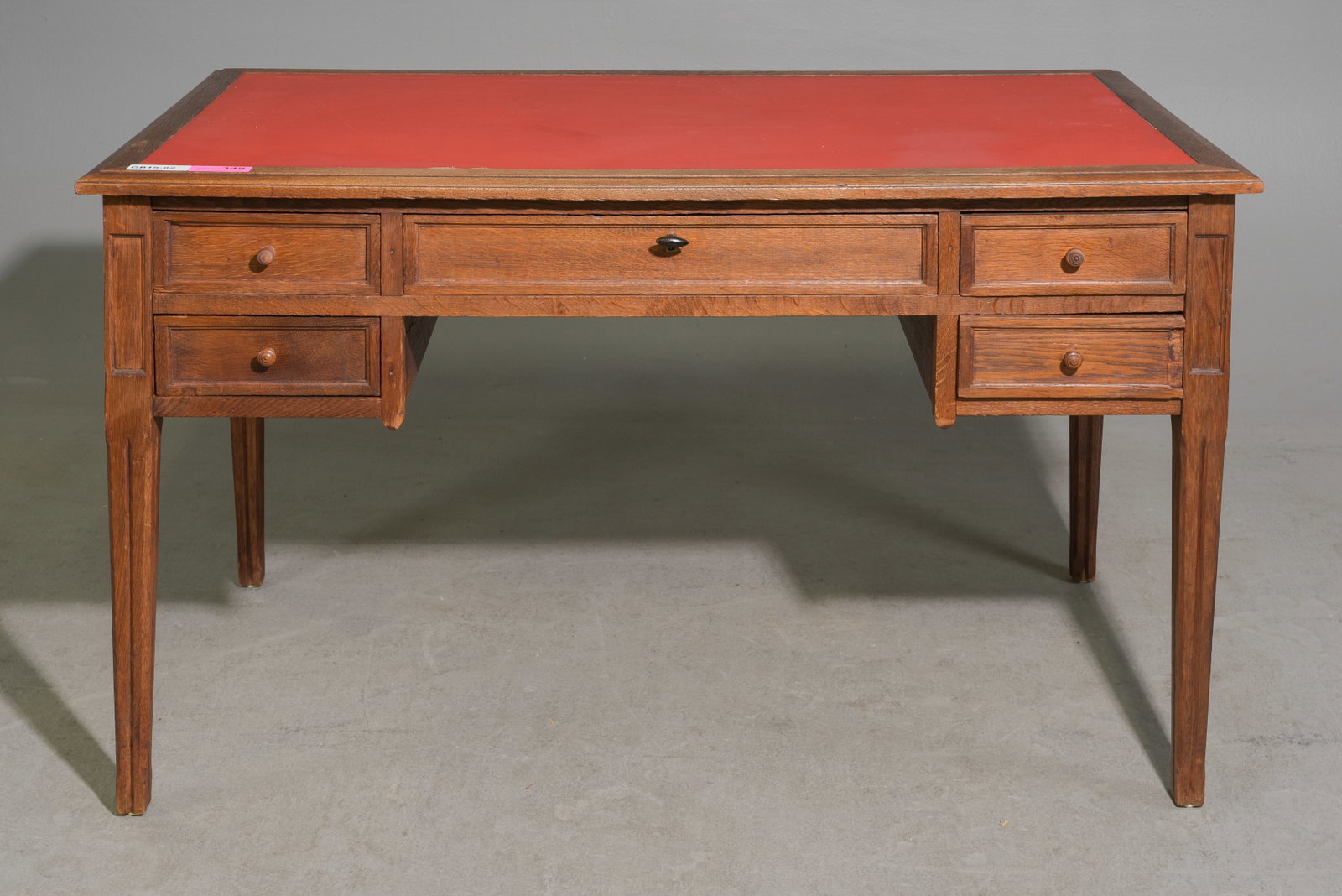 Louis XVI Style Oak Desk with Vinyl Top: French Louis XVI Style Oak Desk with Vinyl Top supported by tapered legs - 29.75 in tall x 51 x 27.5, Kneehole is 23.25 x 44.25