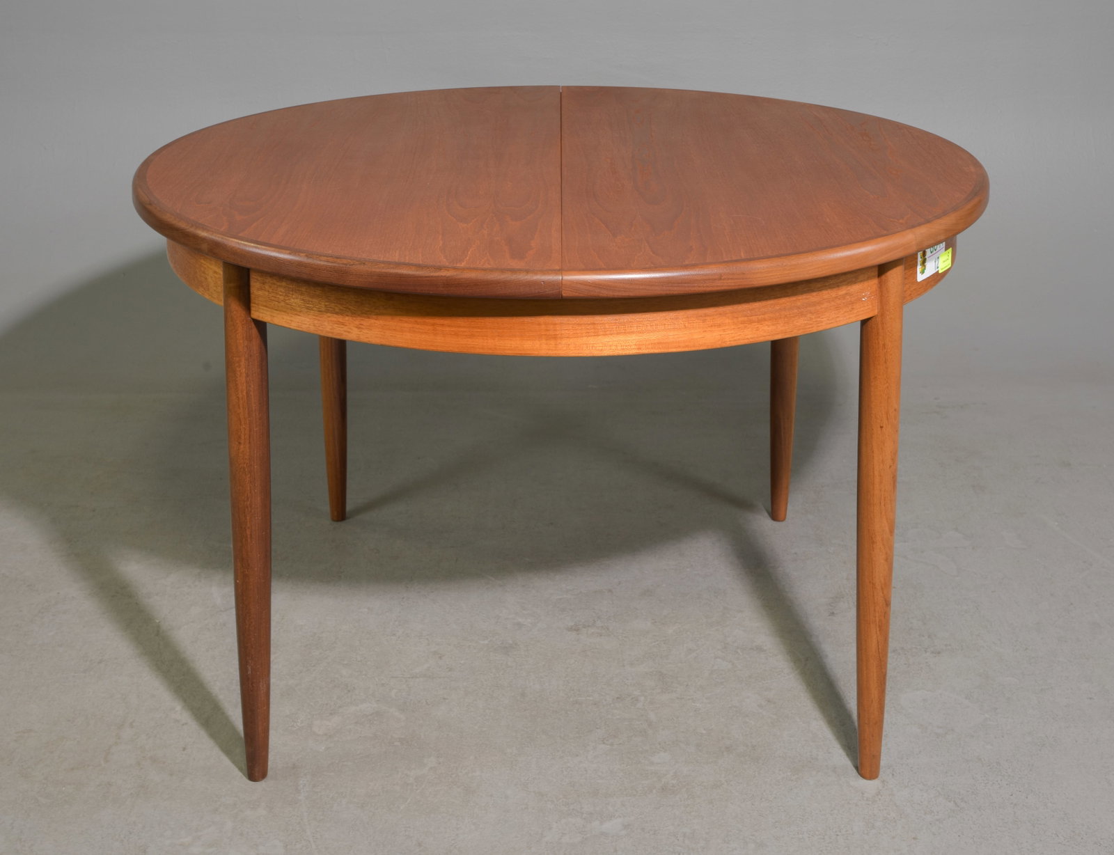 Round Mid Century Table with Pop Up Leaf - Gplan: This Danish Modern Style Teak Dining Table includes a pop-out butterfly style leaf & is made by Mid Century Modern Furniture Maker G Plan ( GPlan ) - Part of their Fresco Range. - 29 in tall x 48