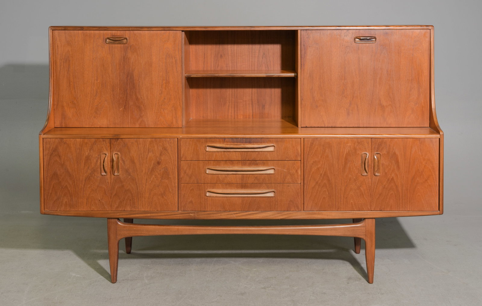 Mid Century Modern Cocktail Cabinet - Gplan Fresco: This Danish Modern Style Teak Cocktail Cabinet / Highboard is Made by British Furniture Maker G-Plan and is part of their Fresco Series - 48 in tall x 73.5 x 18