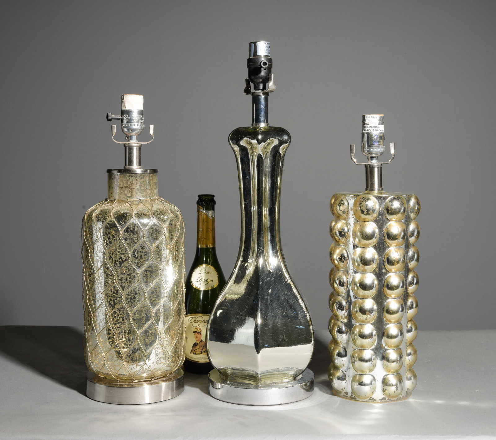 Three Modern Mercury Glass & Metallic Table Lamps: Three Modern Mercury Glass & Metallic Table Lamps - 21 in tall x 7 inch diameter, 18 in tall x 6 inch diameter and 16 in tall x 5.5 inch diameter