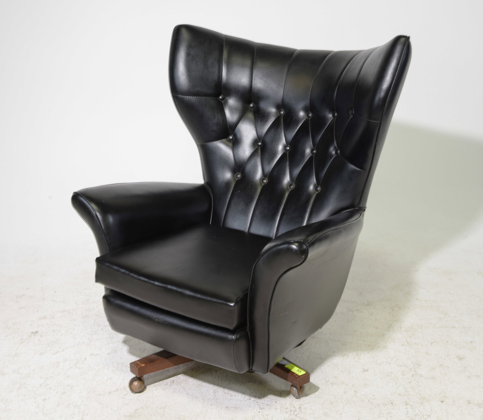 Mid Century Modern Black Wing Back "Villain" Chair: Danish Modern Style Black Wing Back "Villain" Swivel Chair - 40 in tall x 26.5 x 30 with a seat height of 15.5 inches