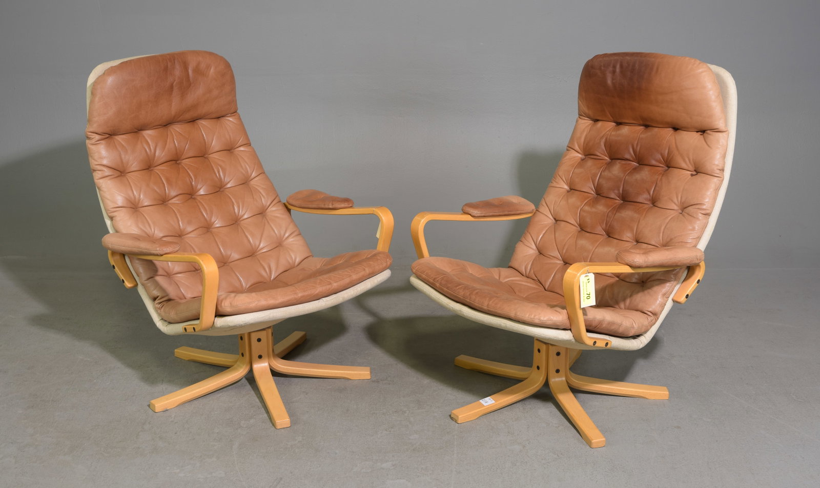 Swedish Sam Larsson for Dux Pair of Arm Chairs: Swedish Mid Century Modern Sam Larsson for Dux Pair of Tufted Leather Swivel Lounge Arm Chairs - 36.25 in tall x 29 x 26 each with a seat height of 15 inches