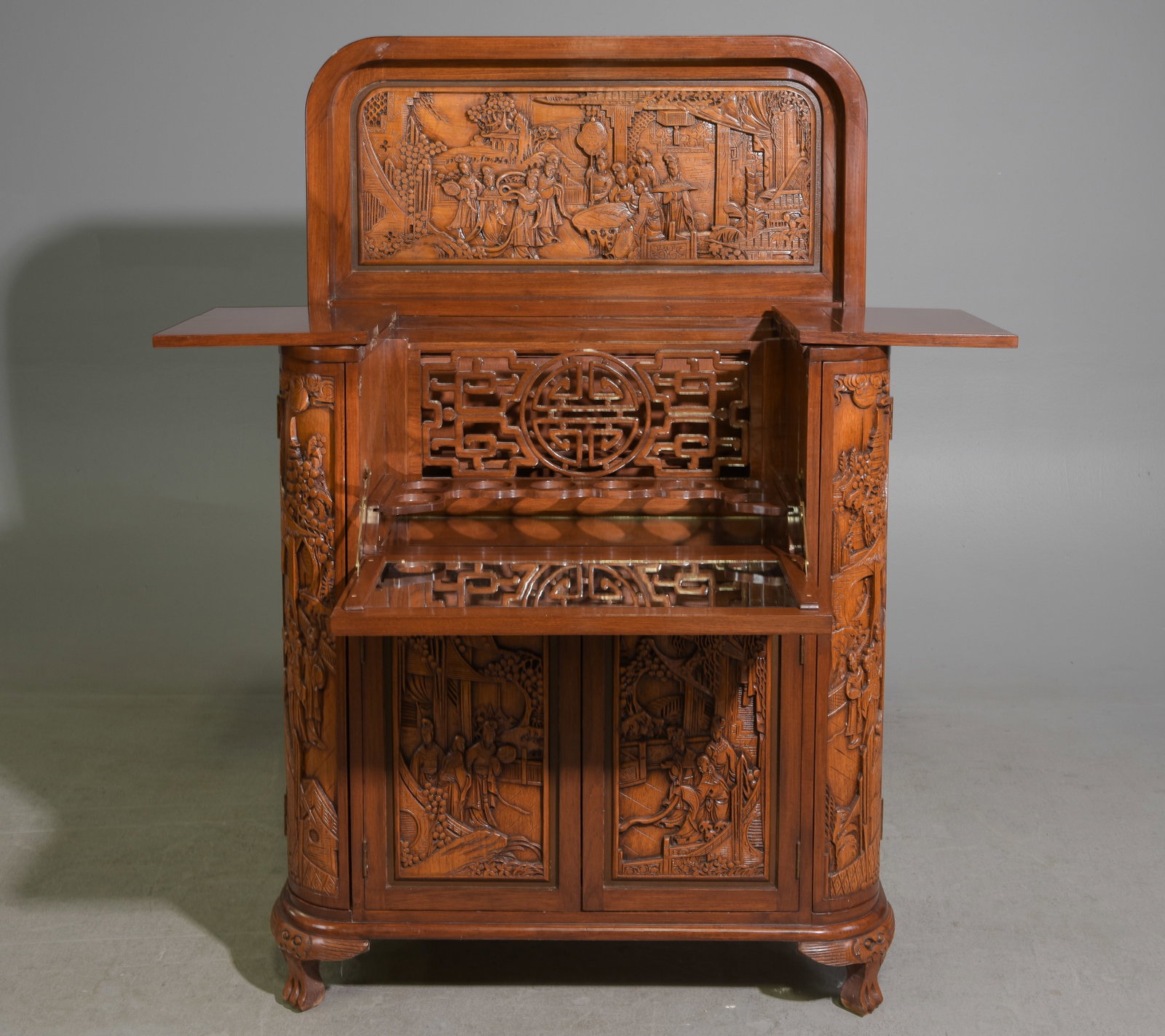 Vintage Oriental Finely Carved Wood Dry Bar / Cocktail Cabinet with deep reliefs depicting: Vintage Oriental Finely Carved Wood Dry Bar / Cocktail Cabinet with deep reliefs depicting traditional landscape and village life scenes - 41 in tall x 36 x 19 when closed