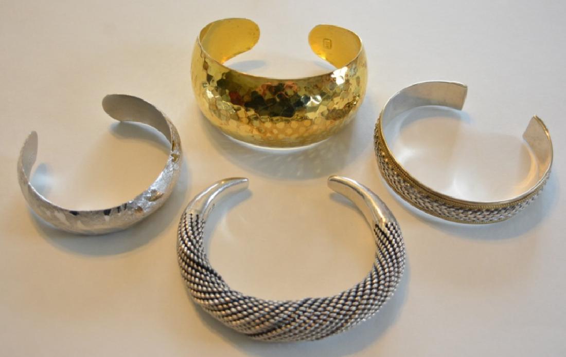 (4) Ladies Sterling Silver Cuff Bracelets: Nice lot of four ladies sterling silver enameled cuff bracelets. The bracelets are in great condition and vary in size and weight. They are all marked .925 or sterling and the total weight is 148.1 gr
