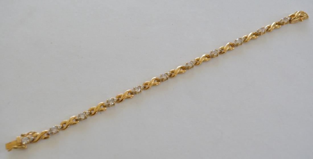 White Sapphire Sterling Silver Tennis Bracelet: 7" lab created white sapphire bracelet. Marked .925.