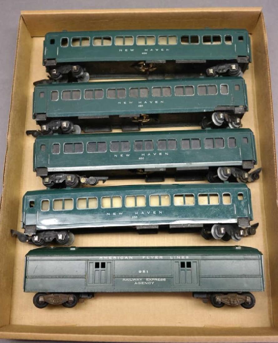 American Flyer New Haven Passenger/REA Train Cars: 4 New Haven 650 passenger cars and 1 Railway Express Agency 951 car.