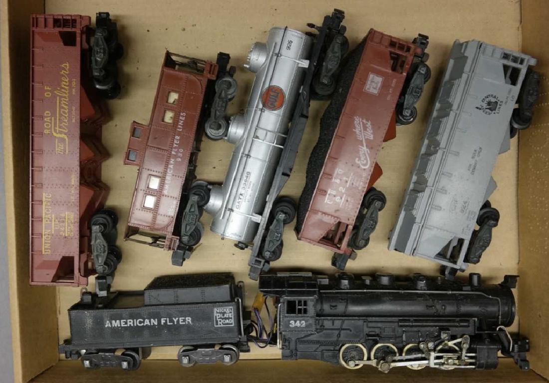 American Flyer 342 Engine w/4 Cars & Caboose: 342 engine w/Nickle Plate tender. Other cars as pictured. All are used and have various levels of wear.