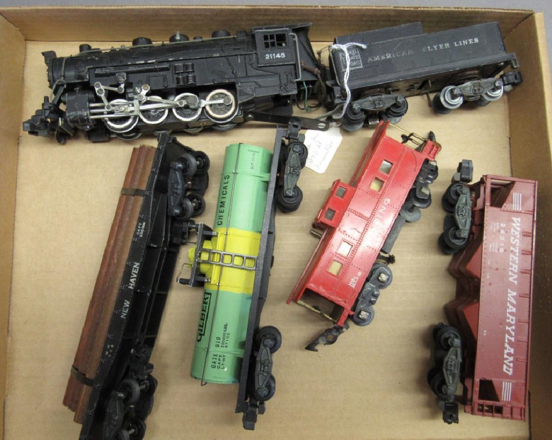 American Flyer 21145 Engine w/3 cars & Caboose: Untested. Very good condition overall. Includes 24219 ore car, Gilbert tanker car, New Haven log car and 630 caboose.