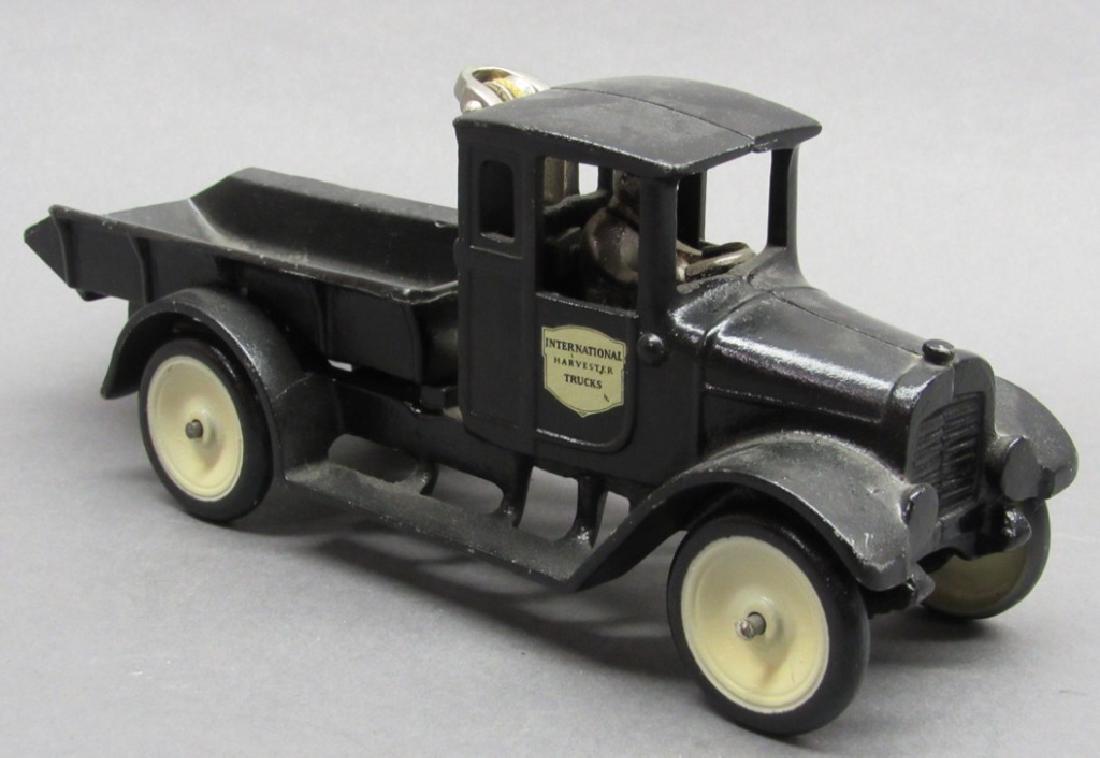 Cast Iron IH Black Baby Dump Truck w/ boom (1 of 8)