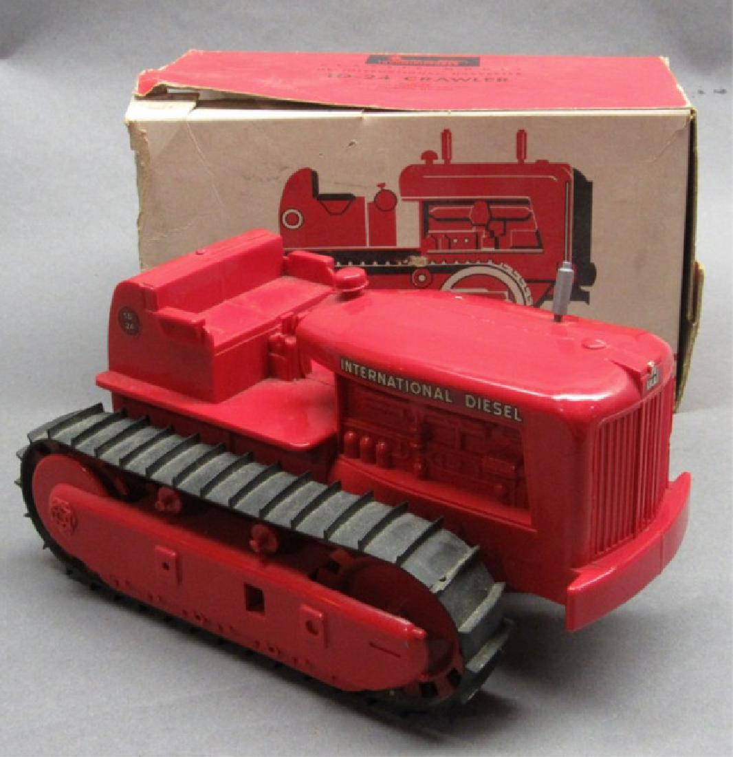 Product Miniature TD 24 IH Crawler w/box: 11", red crawler, excellent condition, box ends are loose in box.