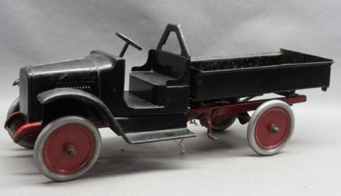 A Frame Buddy L Ratchet Dump Truck- Original: Original water decal, some paint flaking, string is broken, original truck. Out of the Hankins collection.