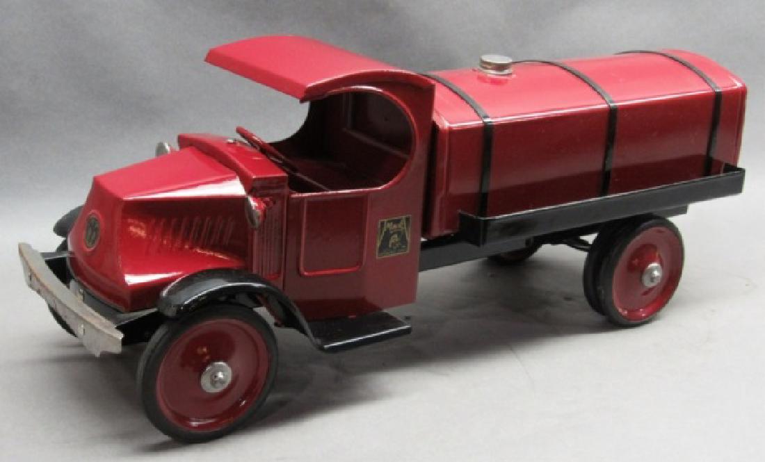 Mack Tanker Truck by Steelcraft- Dual Wheels: Older professional restoration, little wear, pitting on front bumper. 27 inches long.