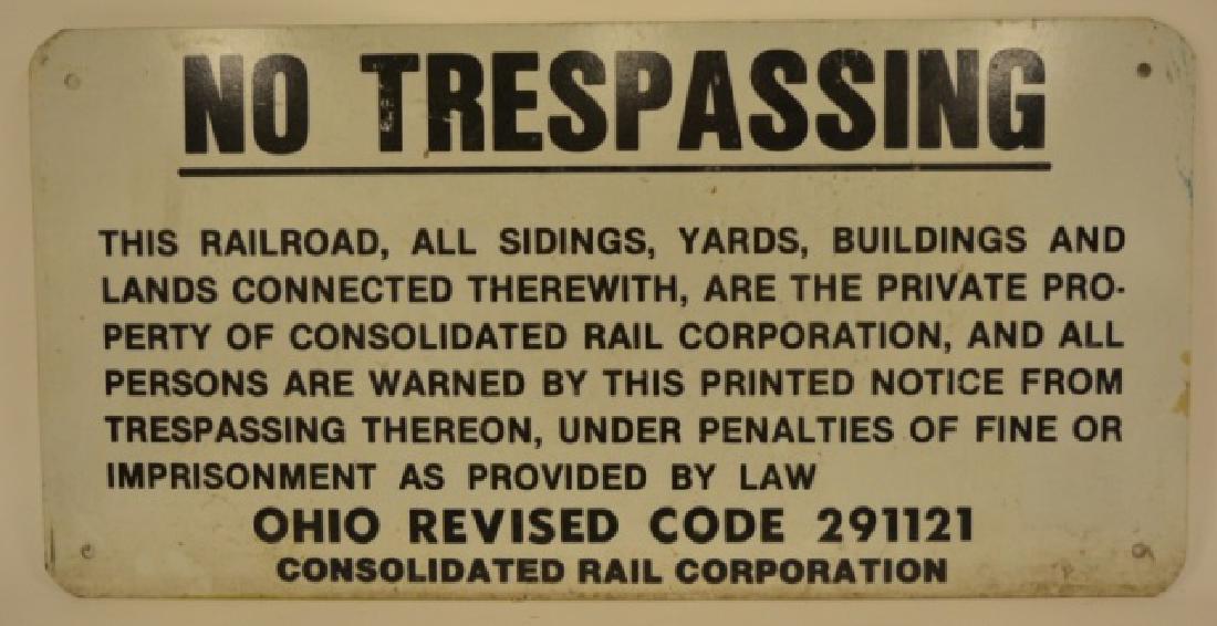 Consolidated Rail Corp. "No Trespassing" Sign: Good condition aluminum Consolidated Rail Corporation "No Trespassing" sign. The sign looks good, but does have some moderate surface wear. Sign measures 12" tall x 24" across.