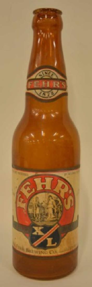 Large Fehr's XL Beer Advertising Bottle: Nice glass Fehr's XL Beer advertising bottle. The condition is good with some light wear. The bottle measures 20" tall.
