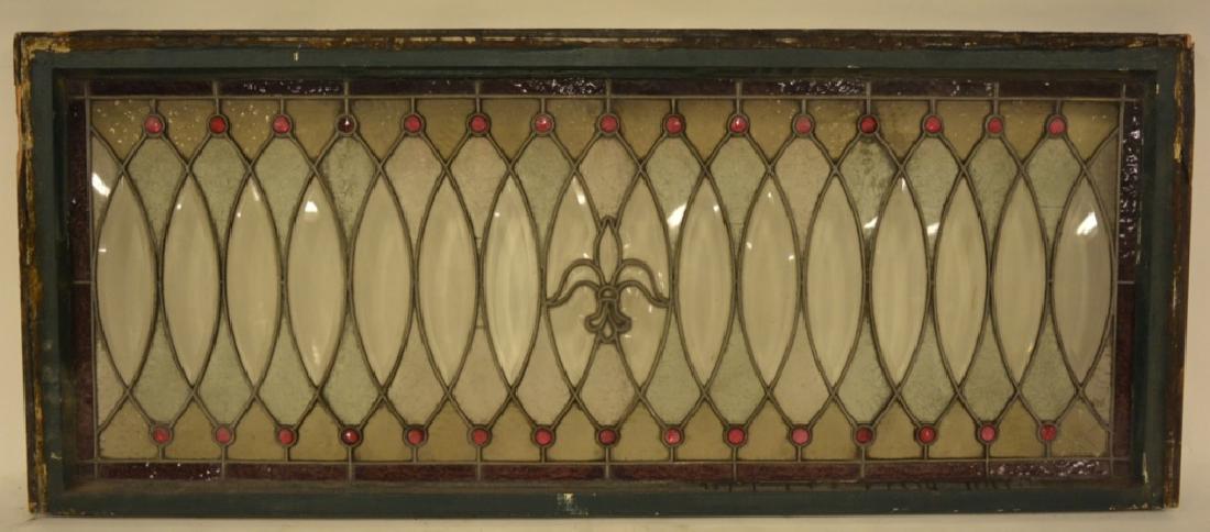 Antique Leaded Glass Door Transom: Beautiful antique leaded glass transom. The transom measures 23.25" tall x 56" across. The panel has a few stress cracks and one broken small panel.