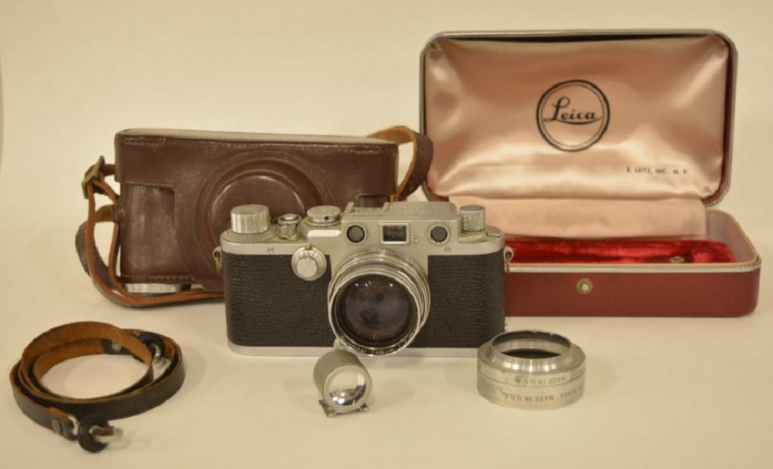 Vintage Leica DRP Camera With Lens & Cases: Nice vintage Leica DRP camera body with Leitz Summitar F=5cm 1:2 lens, leather carrying case, and original hardshell box. Camera and lens are in good cosmetic condition with wear from use and age. The