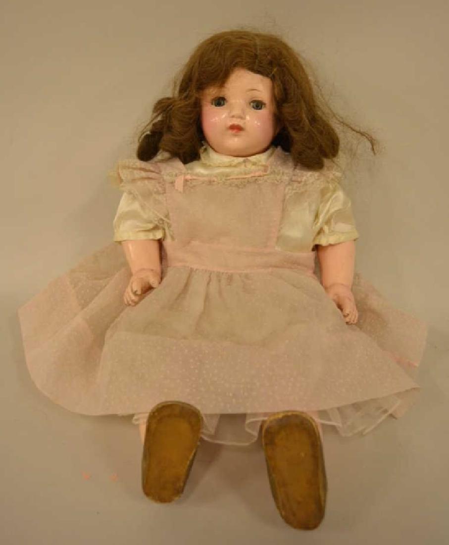 Vintage Effanbee Composition Doll: Nice 24" Effanbee doll with composition head , arms, and legs. Doll comes with nice clothes and sleepy eyes, paint is flaking.