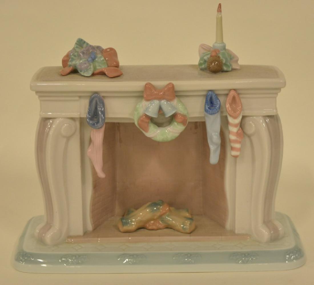 Lladro "Night Before Christmas Fireplace" #6668: The retired figurine measures 7.5" tall and is in mint condition.