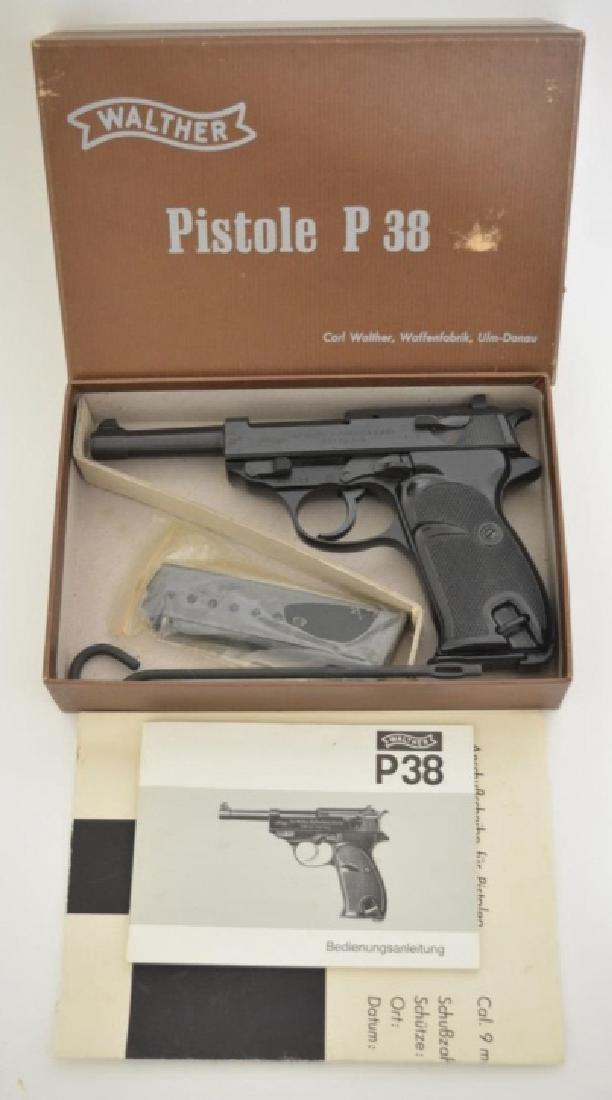Walther P-38 9mm Semi-Auto Pistol MIB: Gun is unfired in the original box with original paperwork, target, & tool. The pistol has a 125mm barrel, blue finish, two mags, and is Model P-38. SN: 139586. FFL required for transfer.