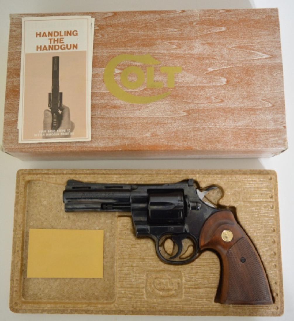 Colt Python .357 Magnum Revolver MIB: Gun is unfired in the original box with original paperwork & tool. The six-shot revolver has a 4" barrel, blue finish, and is a Python Model 3640. SN: E63747. FFL required for transfer.