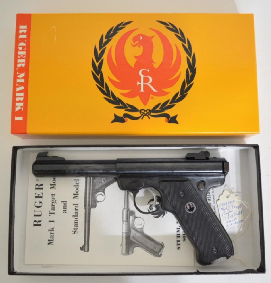 Ruger Mark I .22LR Semi-Auto Target Pistol MIB: Gun is unfired in the original box with original paperwork, target, & tool. The pistol has a 5.5" bull barrel, blue finish, and is catalog #T-512. SN: 10-93789. FFL required for transfer.