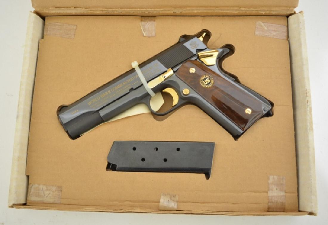 Auto-Ordnance 1911 A1 45 ACP Semi-Auto Pistol MIB: Gun is unfired in the original box with the original paperwork. The WWII Commemorative Model 1911 A1 .45 ACP was made by the Auto-Ordnance Corp of West Hurley, NY. Features 24K gold plate details. SN: