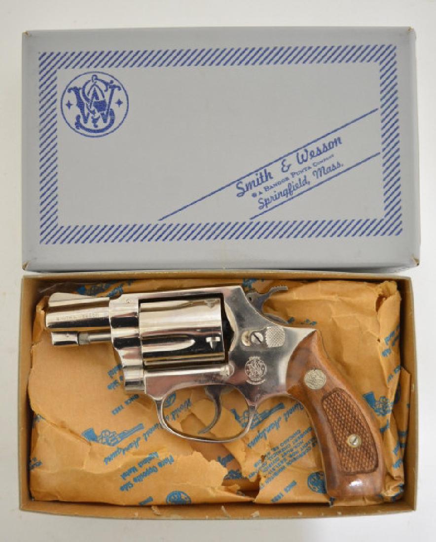 Smith & Wesson Model 36 .38 Special Revolver MIB: Gun is unfired in the original box with original paperwork & tools. The five-shot revolver has a 2" barrel, nickel finish, and is Model 36. SN: 452J55. FFL required for transfer.