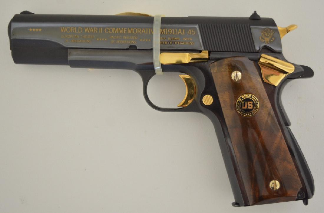 Auto-Ordnance 1911 A1 45 ACP Semi-Auto Pistol: Gun is unfired. The WWII Commemorative Model 1911 A1 .45 ACP was made by the Auto-Ordnance Corp of West Hurley, NY. Features 24K gold plate details. SN: WW2500. FFL required for transfer.