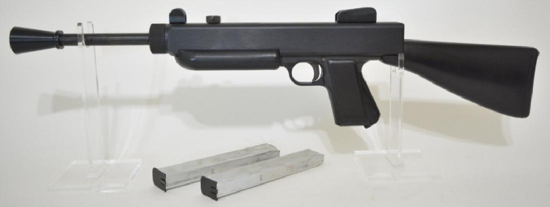 J&R Engineering M68 9mm Semi-Automatic Carbine: Gun is in great condition. The 9mm semi-automatic carbine has a synthetic stock & 16" barrel. It is the M68 model and comes with two magazines. SN: 02384. FFL required for transfer.