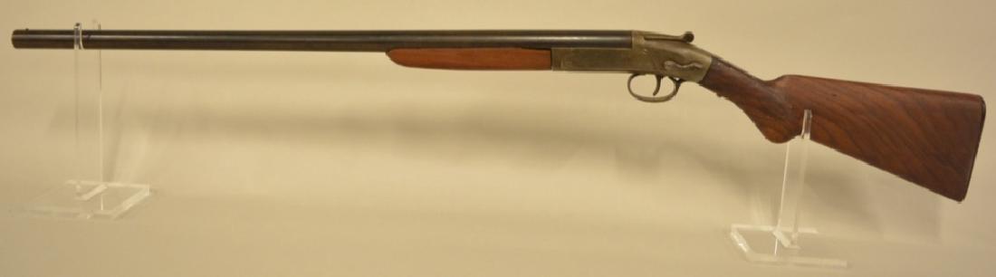 Club Single Shot 12 Gauge Shotgun: Genuine armory steel. Stock has been repaired. SN: 5718. FFL is required for transfer.