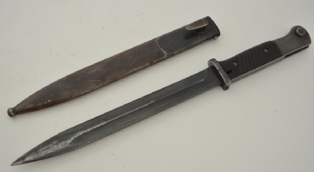 WWII German K98 Mauser Bayonet & Scabbard: Nice German Elite-Diamant K98 bayonet for a Mauser rifle. Bayonet comes with metal scabbard. Blade measures 10" long, overall with scabbard 16" long.