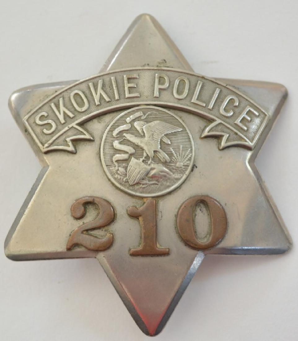 Obsolete Skokie Police Pie Plate Badge: Nice early Skokie Illinois Police pie plate badge #210. The badge was made by C.H. Hanson. On the back theres a hand writen inscription that reads 'W.Coursey". The badge is in nice codition with the p