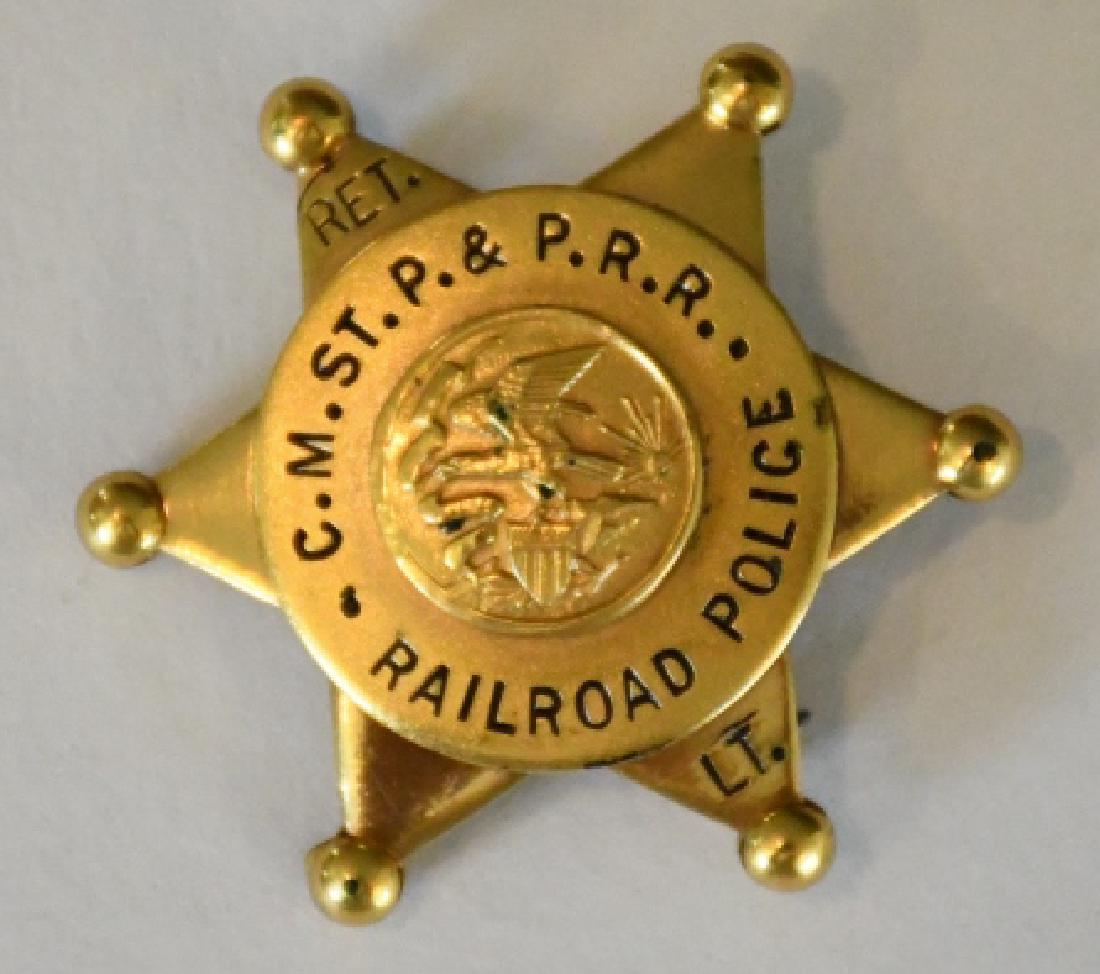 Obsolete C.M.ST.P. & P. R.R.  Lapel Badge (1 of 2)