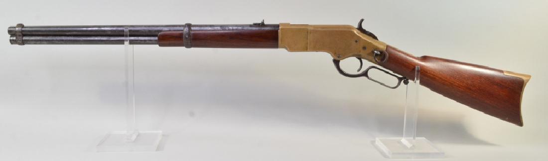Winchester Model 1866 44 R.F. Saddle Ring Carbine: Winchester Model 1866 44 R.F. lever action yellow boy saddle ring carbine. The rifle has a round barrel and is in nice used condition. Serial #103767.