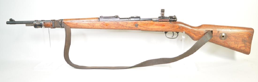 WWII 1940 Mauser Model 98 8mm Bolt Action Rifle: Nice WWII German 1940 Mauser Model 98 8mm Bolt Action Rifle. The rifle is in good condition, marked 1940 on the receiver, and has Nazi Eagle proof marks. Not all of the serial numbers match. Comes wit