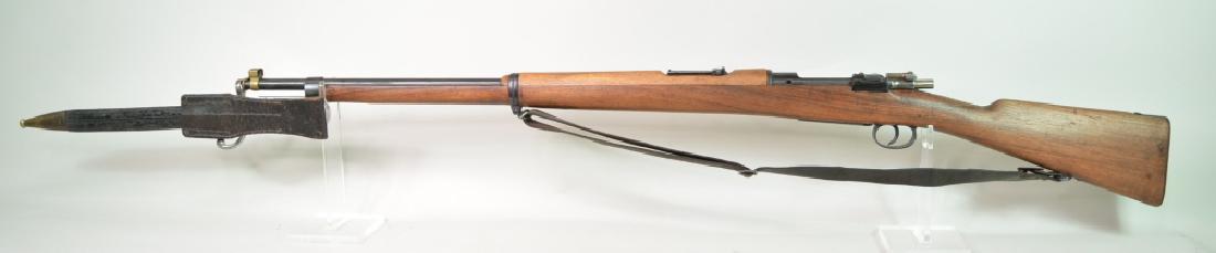 Spanish Oviedo Model 1893 7mm Bolt Action Mauser: Nice Spainish Oviedo Model 1893 7mm Bolt Action Mauser. The Mauser is in very nice used condition and comes with the attached bayonet and leather sling. Receiver and bolt serial numbers match. SN:E112