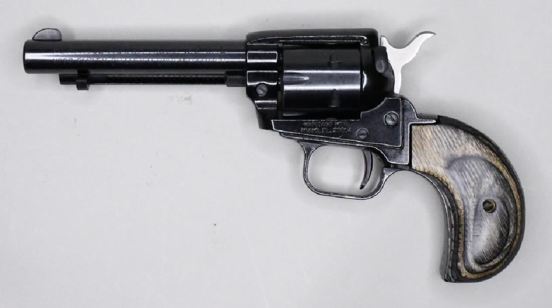 Heritage Mfg. Rough Rider .22 Cal. Revolver NIB: New in box Heritage Manufacturing Rough Rider .22 Caliber Six-Shot Revolver with 4" barrel. The blued revolver is in new condition in the original Heritage box with instructions, extra grips, and two 