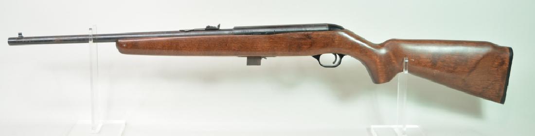 New Haven Mossberg Model 453T 22LR Rifle: New Haven by Mossberg Model 453T semi-automatic rifle in 22LR. The rifle has a 18.25" barrel and is in good condition with some use wear and surface rust. SN:1307815. FFL required for transfer. (212-2