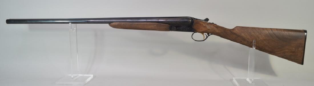 Browning B S/S 20 Gauge Side-By-Side Shotgun: Nice assembled in Korea Browning B S/S side-by-side shotgun in 20 gauge. The shotgun has a 26" barrel and is in good condition with some wear and surface rust. SN:03055RN168. FFL required for transfer
