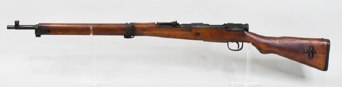 WWII Japanese Model T-99 7.7 Caliber Rifle: Nice WWII Japanese Model T-99 rifle in 7.7 caliber. The rifle has a 25" barrel, ground mum, matching bolt, no cleaning rod. Rifle is in good used condition. SN:57465. FFL required for transfer. (770-2