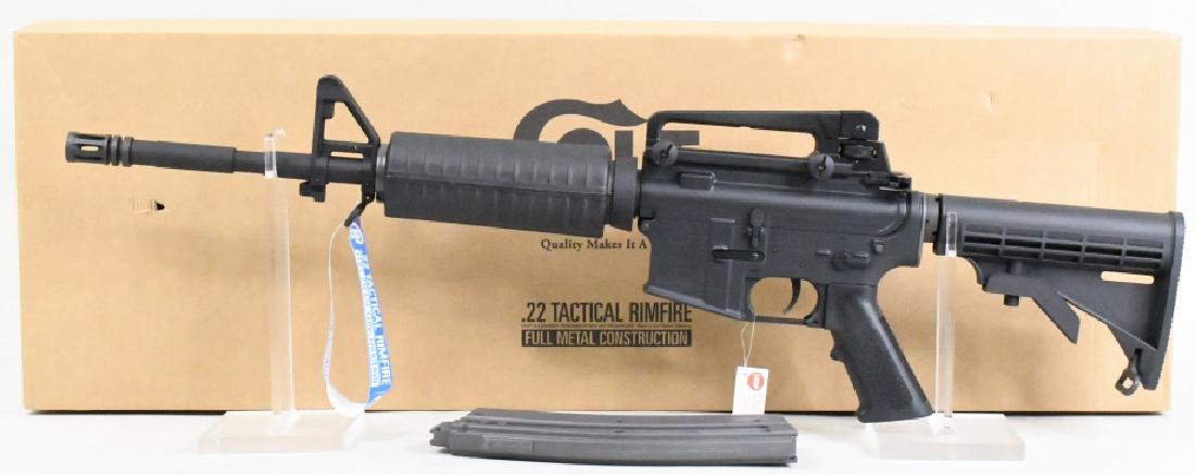 Colt M4 Carbine .22 LR Semi-Auto Rifle NIB: New in box Walther/Colt M4 Carbine semi-automatic rifle in .22 Long Rifle. The black finish rifle has a 16.2" barrel and is in new condition in the original box with lock, 30 round magazine, and paper