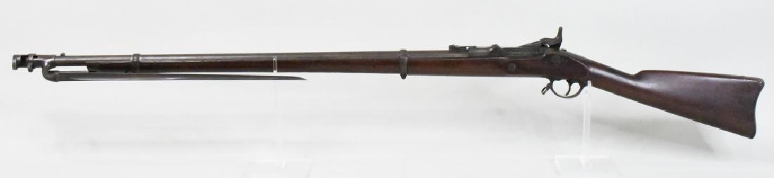 Civil War U.S. Springfield Model 1863 Musket: Nice Civil War U.S. Springfield Model 1863 Musket that was converted to a trapdoor dated 1870. The rifle has a 35.5" barrel, cleaning rod, and bayonet. Rifle is in good used condition. SN:41733. (12)