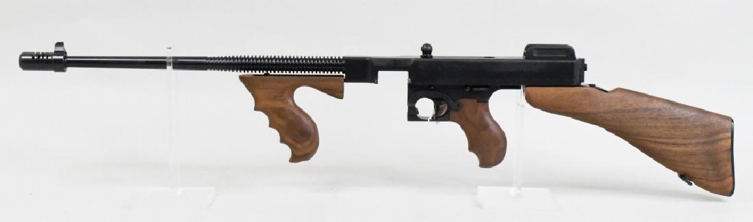 Auto-Ordnance Model Of 1927 A1 Thompson Tommy Gun: New in box Auto-Ordnance Model Of 1927 A1 Thompson Semi-Automatic Tommy Gun in .45 Auto. The rifle has a 16.5" barrel and is in new condition in the original hard case. Includes 100 round drum mag, 30