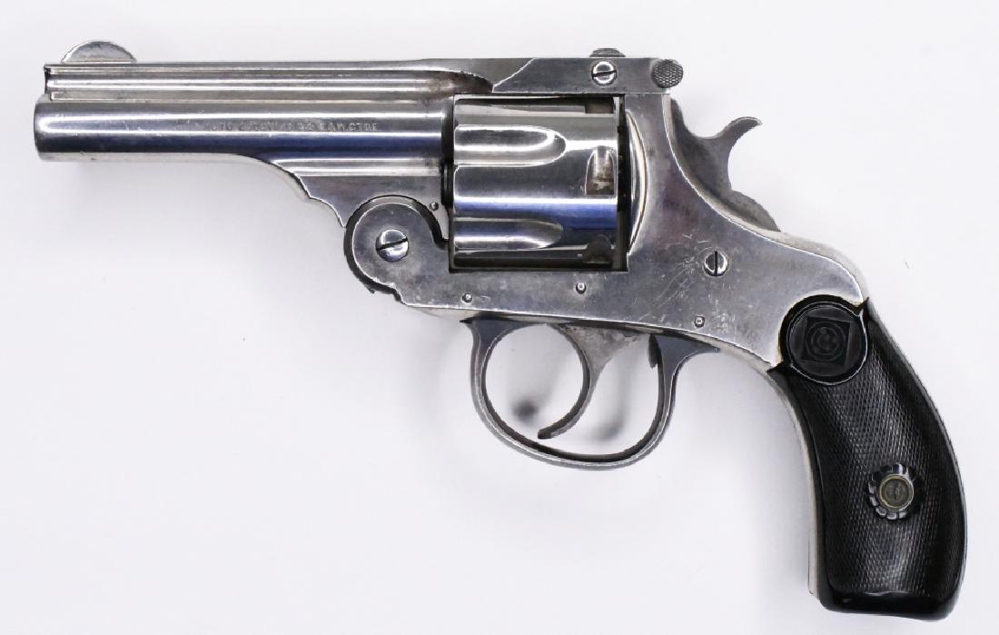 Harrington & Richardson Top Break .32 S&W Revolver: Nice Harrington & Richardson Top Break 6-Shot Revolver in .32 S&W. The nickel finish revolver has a 3.25" barrel and is in good used condition. SN:100506. FFL required for transfer. (749-2) (3)