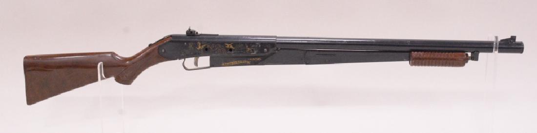 Daisy Model 25 Pump Action BB Rifle: Nice Daisy Model 25 pump action bb rifle with plastic stock. Very nice condition with light wear from play and age.