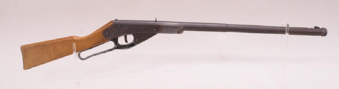 Daisy No. 155 Lever Action BB Rifle: Nice vintage Daisy no.155 lever action bb rifle with wood stock. Good condition with pitting to barrel and wear to wood stock.