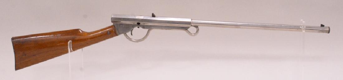 Quackenbush No.10 Push Barrel BB Gun: 1930s Quackenbush model 10 push barrel single shot bb gun. Very nice condition with light expected wear from use and age. Serial no. 10-16129